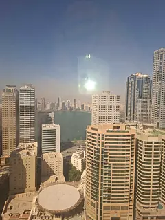 Apartment for rent in Sharjah Al Khan luxury two bedroom hall with master rooms maid room free pool