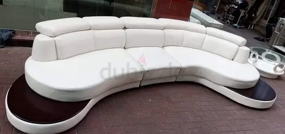 Curved White Leather Sofa with Integrated Side Tables