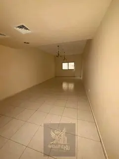Two bedrooms and a living room in Al Majaz 3 with a maid's room and parking inside the building 