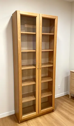 Tall Wooden Display Cabinet with Glass Doors - Light Oak