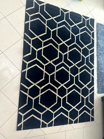 Dark blue geometric area rug - good condition