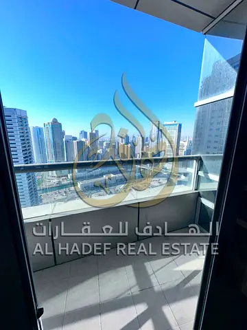 High-End Living with FREE Covered Parking in Al Taawun! Modern 1BR + Hall Apartment with Balcony & En-Suite Master Bedroom (2 Bathrooms) – 4 Easy Paym