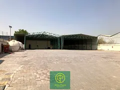 Al Quoz 22,000 sq. Ft open yard with built-in open shed facing the road in a prime location