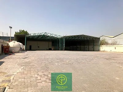 Al Quoz 22,000 sq. Ft open yard with built-in open shed facing the road in a prime location