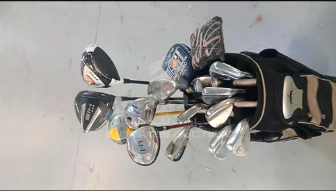 Complete set of used golf clubs with bag - drivers, irons, putter