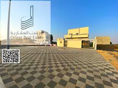 Corner villa for sale in Ajman, Al Helio 1 area. The villa consists of 3 master bedrooms, a living