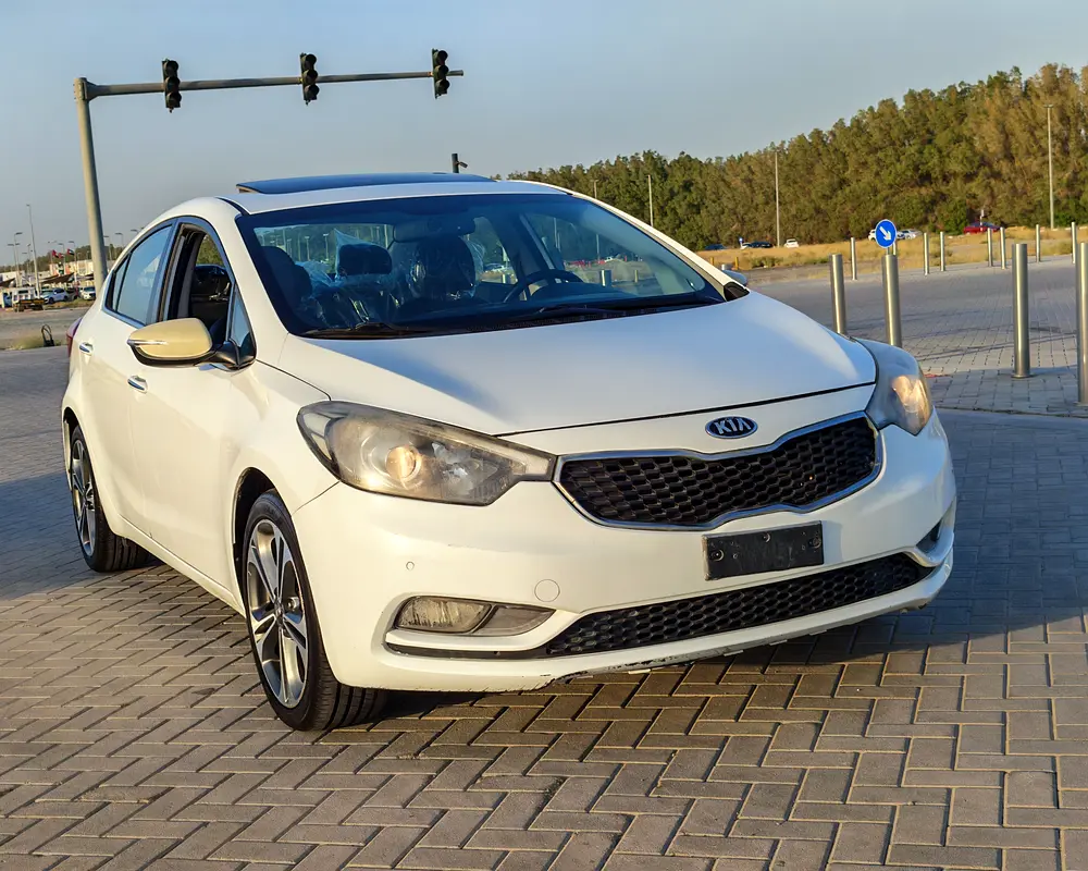 Kia Cerato 2016 — photo 1 of 20