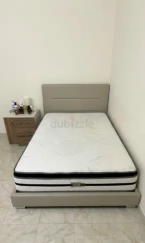 Queen bed frame with headboard and mattress - good condition