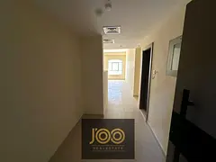 Two-bedroom apartment with a living room, one month's laundry room, and free parking for annual 