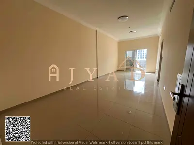 Annual rent first occupancy 2BR apartment in Al Jurf 3 Ajman near Dubai and Sharjah exit 3 baths balcony wardrobes central AC spacious layout