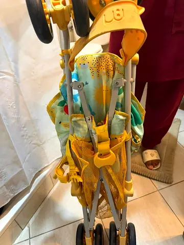Lightweight Yellow Folding Baby Stroller - Compact and Used