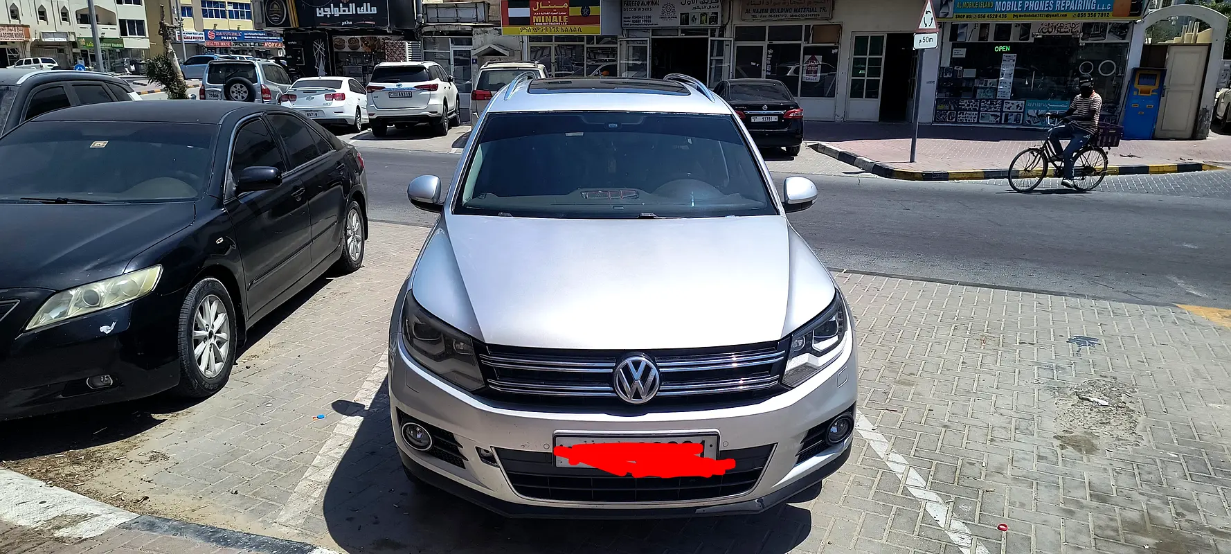 Volkswagen Tiguan 2012 — photo 1 of 16
