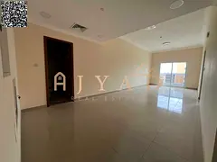 Brand-new 1BR hall in Al Jurf 3: built-in wardrobes, central AC, balcony, 2 baths, spacious layout,