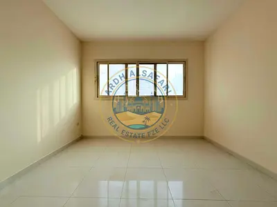 SPACIOUS ONE BEDROOMHALL // NEAR AL MADINA SHOPPING CENTRE // FAMILY BUILDING // MUWAILEH BUS STATION NEARBY// EASY ACCESS TO DUBAI