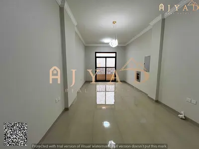 For rent: 1 bed hall in Al Mowaihat 3, first occupancy, new building, near Al Shula School, master BR, 2 baths, balcony, built-in wardrobes, AC