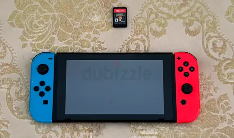 Nintendo Switch console with Joy-Cons and game card (used)