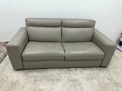 Pure leather Natuzzi two seater sofabed