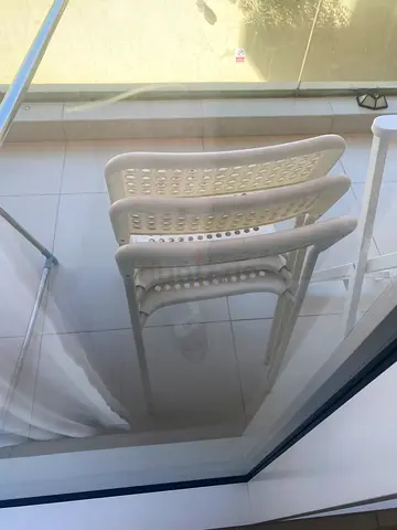 Set of 4 White Plastic Stackable Chairs - Good Condition