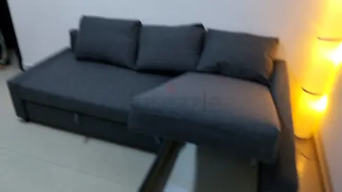 Ikea Gray L-shaped Sofa Bed with Chaise