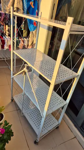 White metal shelving unit on wheels - 4 tiers, foldable