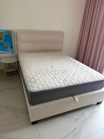 Single beige fabric divan bed with mattress - good condition