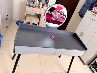 Modern dressing table with mirror and drawers