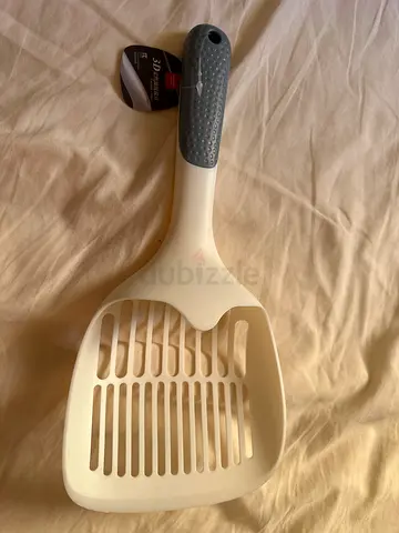 New Unused cat litter scoop with rubber grip
