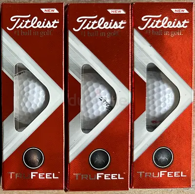 Three sleeves of Titleist TruFeel golf balls.