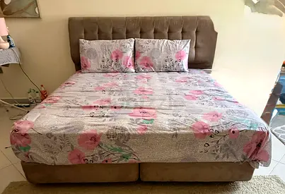 King-size upholstered bed with headboard and mattress (used)