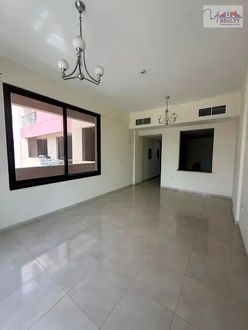 Spacious 1BR Apartment | Spica Residential JVC | Community & Road View | Unfurnished