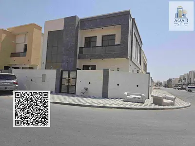For sale, a corner villa - two floors, including registration fees, close to Sheikh Mohammed bin Zayed Road - freehold for all nationalities with the right of inheritance to children for life