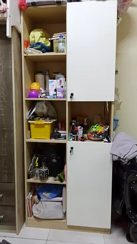 Tall wooden storage cabinet with lockable doors - good condition