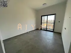 Two-bedroom apartment, first tenant, annual rent in Al Alia, Ajman. Free month, built-in wardrobes,