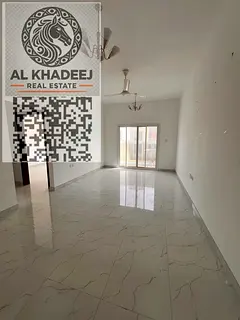 Two bedrooms, a spacious living room, and a balcony with a view in Al Muwaihat 3 area, close to all