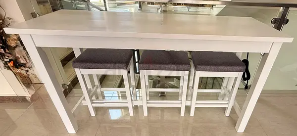 White high counter table with 3 matching stools
