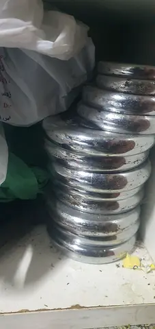 Set of chrome dumbbell weight plates (used)