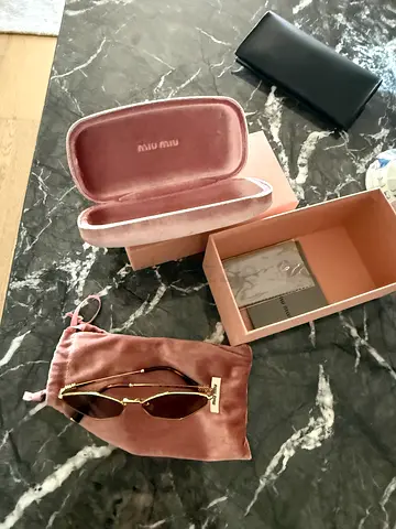 Sunglasses Miu Miu