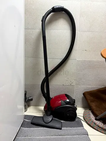 Red canister vacuum cleaner - used, good condition