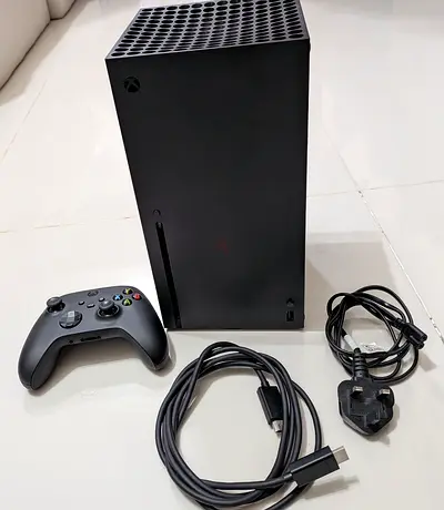 Xbox Series X console with controller and cables - Good condition