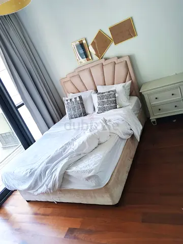 Queen upholstered bed with headboard and mattress - light beige