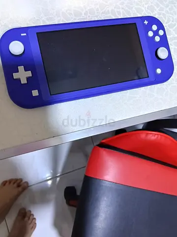 Nintendo Switch Lite Comes With An Sd Card And Original Charger A bit negotiable
