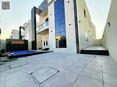 Modern villa with stone facade and swimming pool, registration fees included.