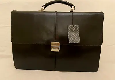 Black leather briefcase with top handle — new with tag