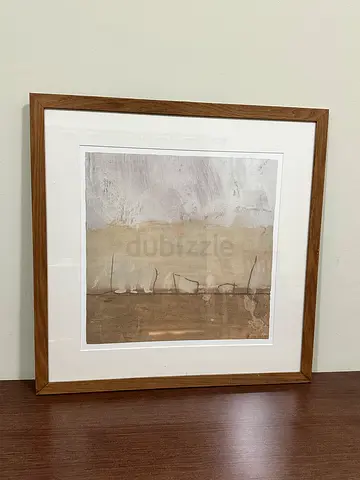 Framed abstract landscape print in wooden frame