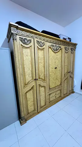 King Size bed + 6 Door wardrobe+Dresser with Mirror+Two Side tables and Free two seater sofa.