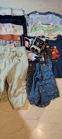 Assorted Baby Clothes and Accessories Collection