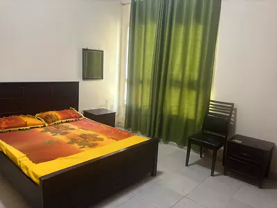 Fully furnished master bedroom in a sharing one bhk flat in emirates city for rent