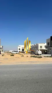Commercial land for sale in Al Hooshi area, first row on Maliha Road - Sharjah