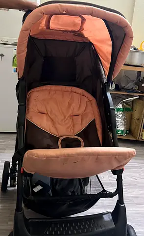 Used peach and brown standard baby stroller - good condition