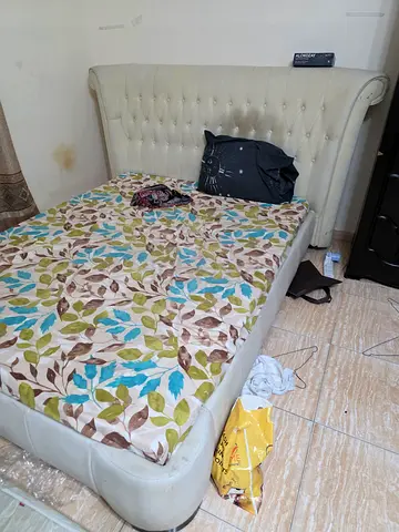 White tufted queen bed frame with headboard - used with matress